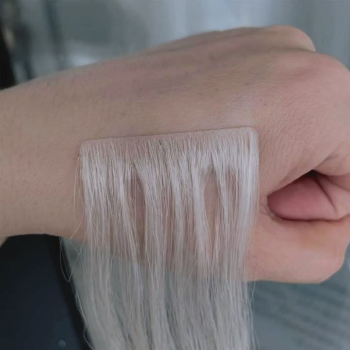 Load video: Wedoo-Wigs-Remy-Human-Hair-Pure-Light-Straight-Tape-Hair-Extensions-Injected-Tape-Wear-Video